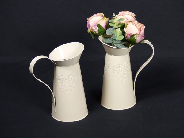 Vintage cream jugs with flowers for Weddings